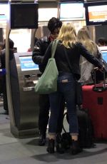 LILI REINHART and Cole Sprouse at Airport in Vancouver 10/07/2017