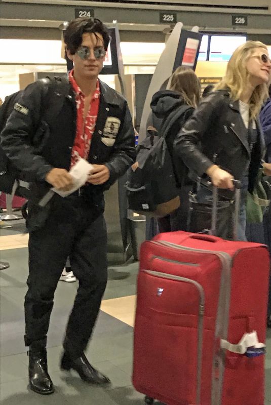 LILI REINHART and Cole Sprouse at Airport in Vancouver 10/07/2017