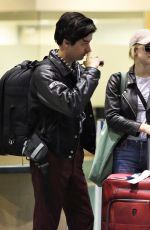 LILI REINHART and Cole Sprouse at Airport in Vancouver 10/10/2017