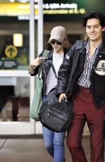 LILI REINHART and Cole Sprouse at Airport in Vancouver 10/10/2017