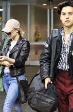 LILI REINHART and Cole Sprouse at Airport in Vancouver 10/10/2017