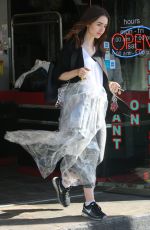 LILY COLLINS Getting Up Her Dry Cleaning in West Hollywood 10/11/2017