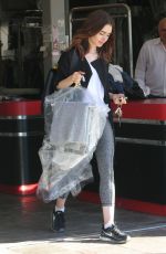 LILY COLLINS Getting Up Her Dry Cleaning in West Hollywood 10/11/2017