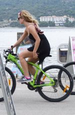 LILY JAMES Out Riding a Bike in Croatia 10/06/2017