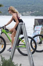 LILY JAMES Out Riding a Bike in Croatia 10/06/2017