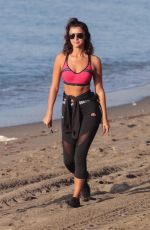 LUCY MECKLENBURGH in Tights Out at a Beach in Marbella 10/11/2017