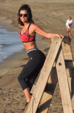 LUCY MECKLENBURGH in Tights Out at a Beach in Marbella 10/11/2017