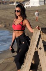 LUCY MECKLENBURGH in Tights Out at a Beach in Marbella 10/11/2017