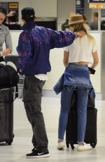 MEGAN BLAKE IRWIN and Nicolo Knows Kissing at Sydney Airport 10/19/2017