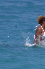 MELANIE BROWN in Bikini on Vacation in Hawaii 10/07/2017