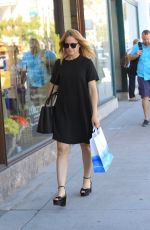 MENA SUVARI Out Shopping in Beverly Hills 10/26/2017