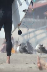 MILEY CYRUS in Bikini Top and Denim Shorts at a Beach in Malibu 10/16/2017