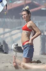 MILEY CYRUS in Bikini Top and Denim Shorts at a Beach in Malibu 10/16/2017