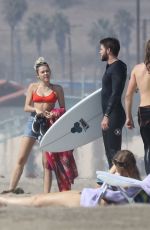 MILEY CYRUS in Bikini Top and Denim Shorts at a Beach in Malibu 10/16/2017