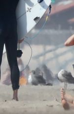 MILEY CYRUS in Bikini Top and Denim Shorts at a Beach in Malibu 10/16/2017