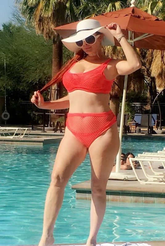 PHOEBE PRICE in Bikini at a Pool in Palm Springs 10/03/2017