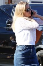 REESE WITHERSPOON in Denim Skirt Arrives at Her Office in Los Angeles 10/26/2017