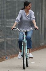 SELENA GOMEZ Out Riding a Bike After Splitting from The Weeknd in Los Angeles 10/30/2017