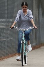 SELENA GOMEZ Out Riding a Bike After Splitting from The Weeknd in Los Angeles 10/30/2017