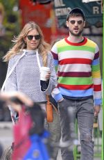 SIENNA MILLER and Tom Sturridge Walk Their Dog in New York 10/13/2017