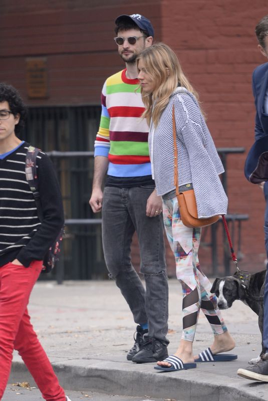 SIENNA MILLER and Tom Sturridge Walk Their Dog in New York 10/13/2017