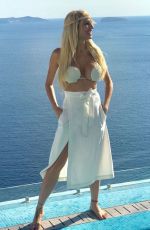 VICTORIA XIPOLITAKIS in Bikini Top on Vacation in Santorini 10/23/2017