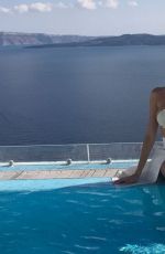 VICTORIA XIPOLITAKIS in Bikini Top on Vacation in Santorini 10/23/2017