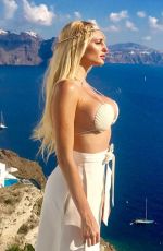 VICTORIA XIPOLITAKIS in Bikini Top on Vacation in Santorini 10/23/2017