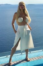 VICTORIA XIPOLITAKIS in Bikini Top on Vacation in Santorini 10/23/2017