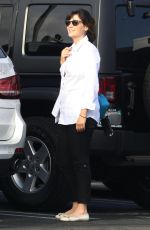 ZOEY DESCHANEL and Her Husband Jacob Pechenik Shopping for a New Car in Los Angeles 09/30/2017