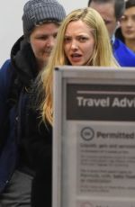 AMANDA SEYFRIED at LAX Airport in Los Angeles 11/27/2017
