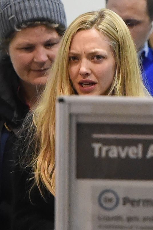 AMANDA SEYFRIED at LAX Airport in Los Angeles 11/27/2017