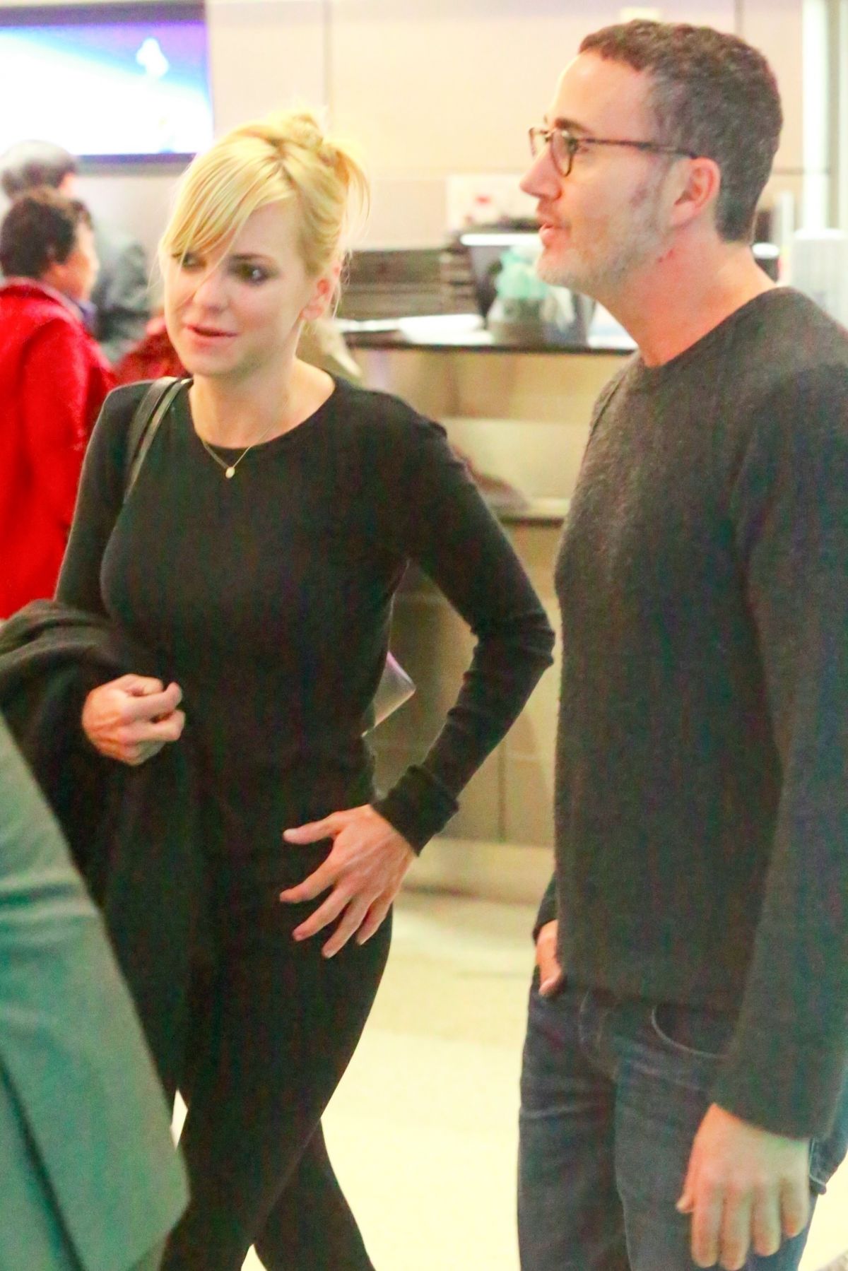 ANNA FARIS and Michael Barrett at LAX Airport in Losa Angeles 11/11 ...