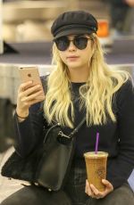 ASHLEY BENSON at LAX Airport in Los Angeles 11/22/2017