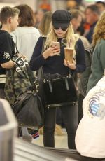 ASHLEY BENSON at LAX Airport in Los Angeles 11/22/2017