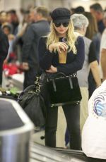 ASHLEY BENSON at LAX Airport in Los Angeles 11/22/2017