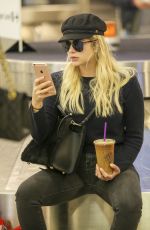 ASHLEY BENSON at LAX Airport in Los Angeles 11/22/2017