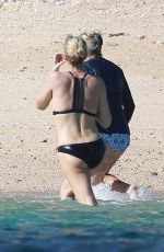 CHARLIZE THERON in Bikini on the Beach in Los Cabos 11/23/2017