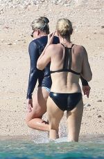 CHARLIZE THERON in Bikini on the Beach in Los Cabos 11/23/2017