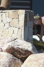 CHARLIZE THERON in Bikini on the Beach in Los Cabos 11/23/2017