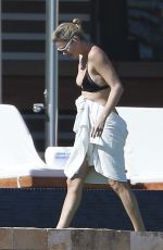 CHARLIZE THERON in Bikini on the Beach in Los Cabos 11/23/2017