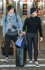CHLOE MORETZ and Brooklyn Beckham at JFK Airport in New York 11/27/2017