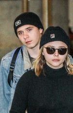 CHLOE MORETZ and Brooklyn Beckham at JFK Airport in New York 11/27/2017
