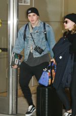 CHLOE MORETZ and Brooklyn Beckham at JFK Airport in New York 11/27/2017