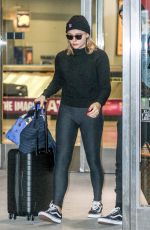 CHLOE MORETZ and Brooklyn Beckham at JFK Airport in New York 11/27/2017