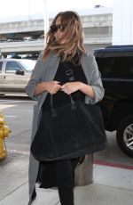 CHRISSY TEIGEN at LAX Airport in Los Angeles 11/15/2017