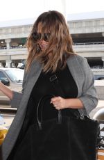 CHRISSY TEIGEN at LAX Airport in Los Angeles 11/15/2017