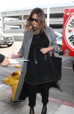 CHRISSY TEIGEN at LAX Airport in Los Angeles 11/15/2017