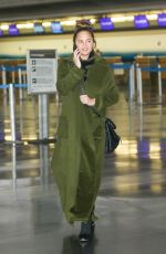 CHRISSY TEIGEN at Los Angeles International Airport 11/06/2017
