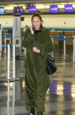 CHRISSY TEIGEN at Los Angeles International Airport 11/06/2017